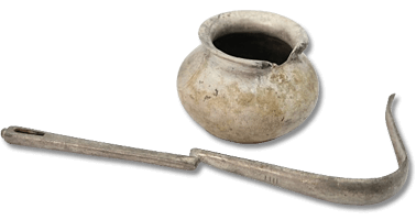 Lot 6. Roman Athlete's Strigil and Balsamarium 1st Century BC-1st Century AD.